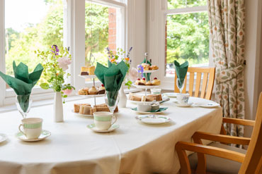 Residents dining at care home
